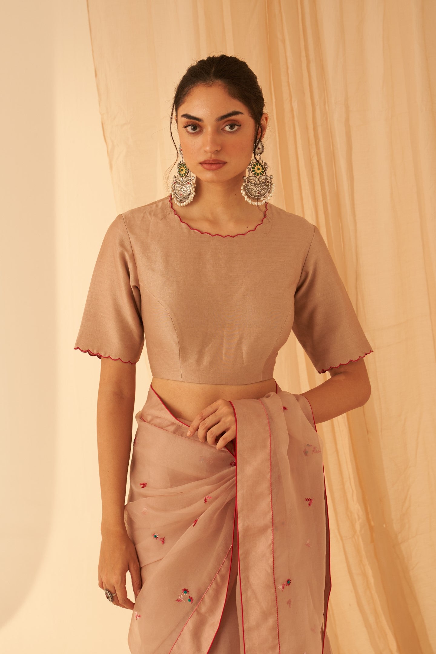 Light rose gold chanderi blouse woth scallop at neckline and sleeves edges