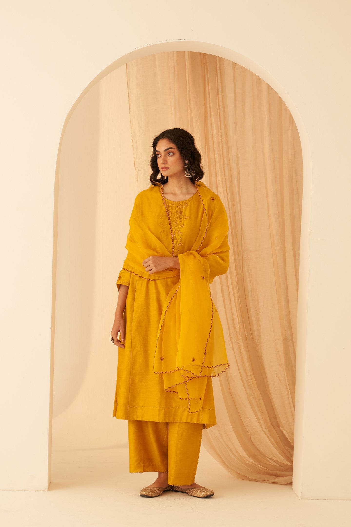 Mustard Chanderi floral  embroidered and katha stitched work kurta paired with pant & organza dupatta