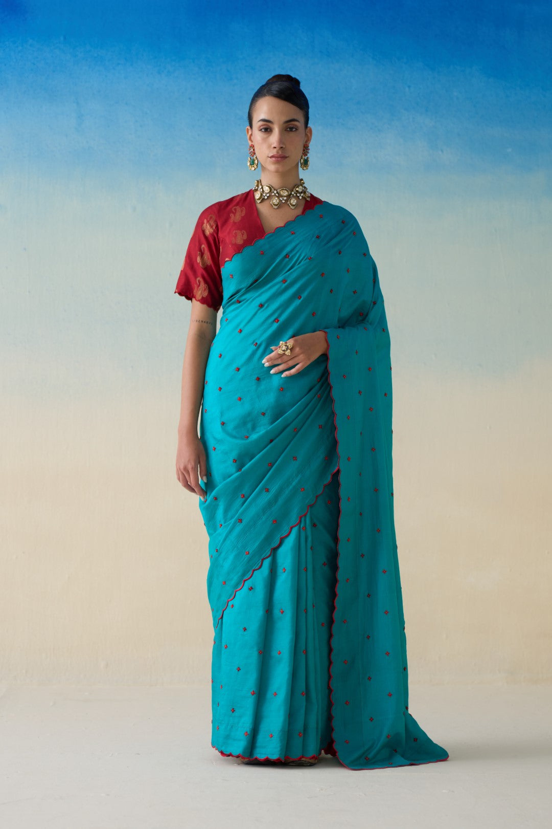 Turquoise silk embroidered saree comes with an organic cotton stitched petticoat ( 02 Pcs.)