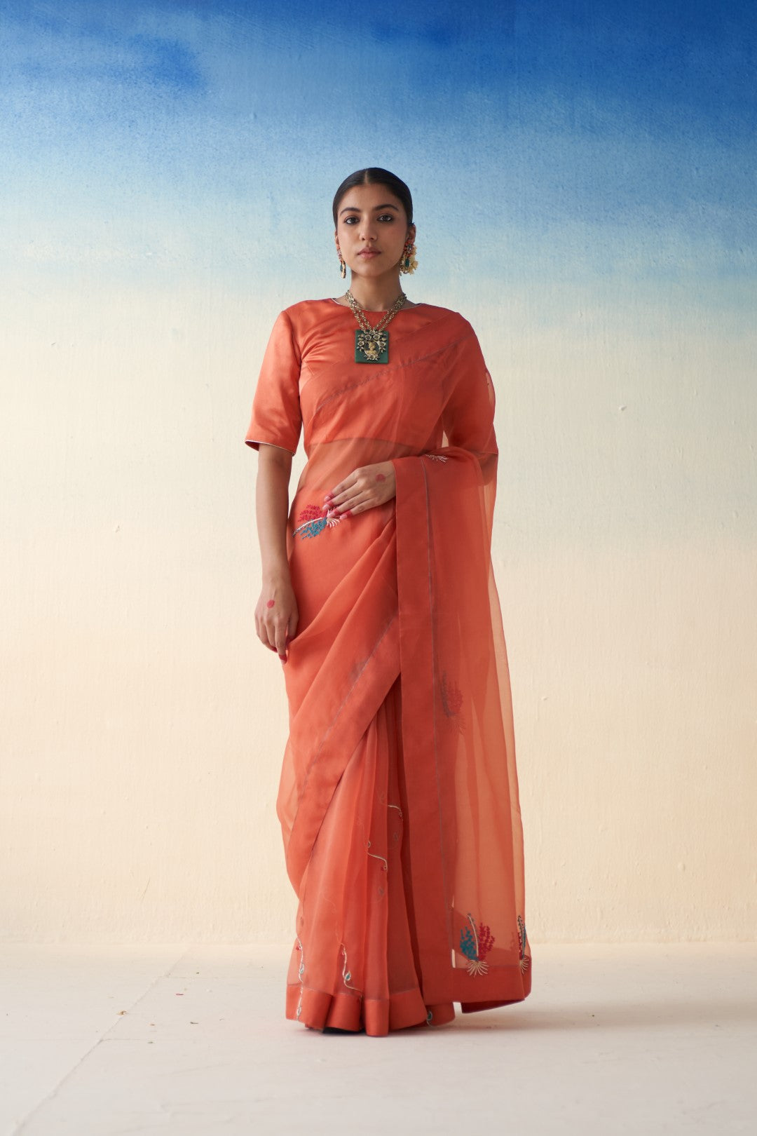 Rust organza motifs embroidered saree comes with an organic cotton stitched petticoat (02 Pcs.)