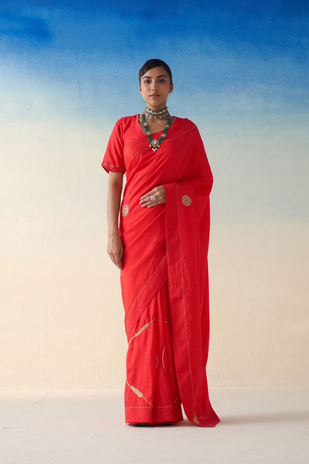 Red silk embroidered motifs saree comes with an organic cotton stitched petticoat (02 Pcs.)