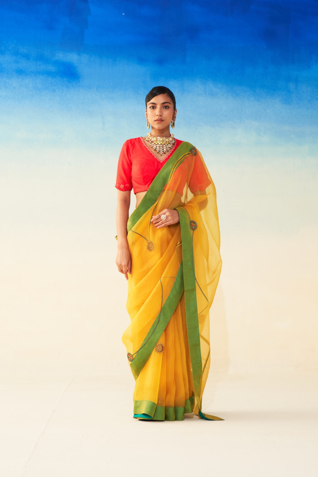 Yellow organza jaal embroidered saree comes with an organic cotton stitched petticoat (02 Pcs.)