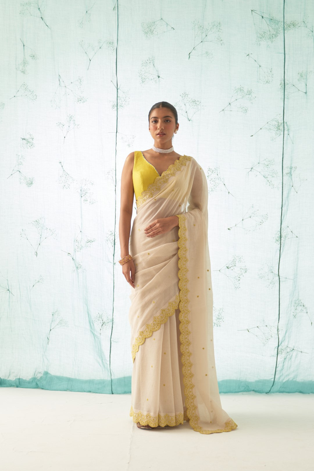 Ivory Chanderi Saree Set with Yellow scallop border Comes With Stitched Chanderi Blouse and Organic Cotton Stitched Petticoat ( 03 Pcs. )