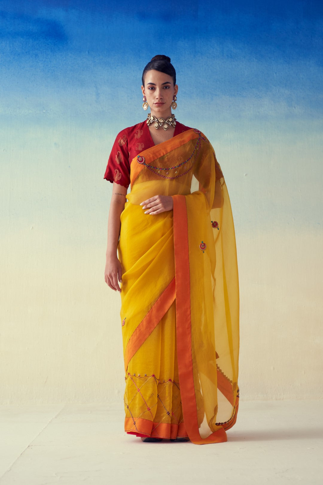 Yellow organza embroidered saree comes with an organic cotton  petticoat (02 Pcs.)