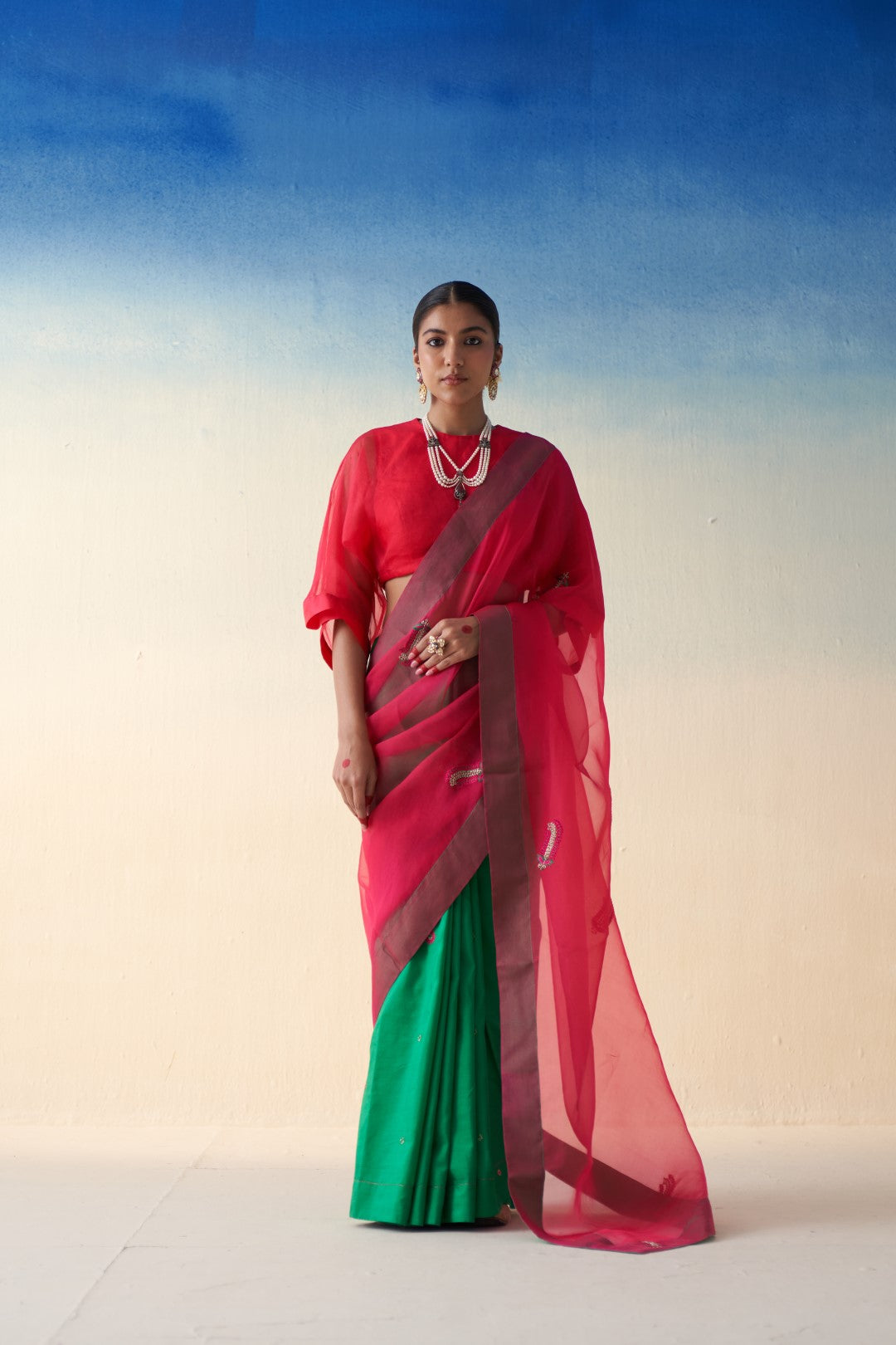 Green- Fuchsia jaal embroidered organza saree comes with an organic cotton stitched petticoat (02 Pcs.)