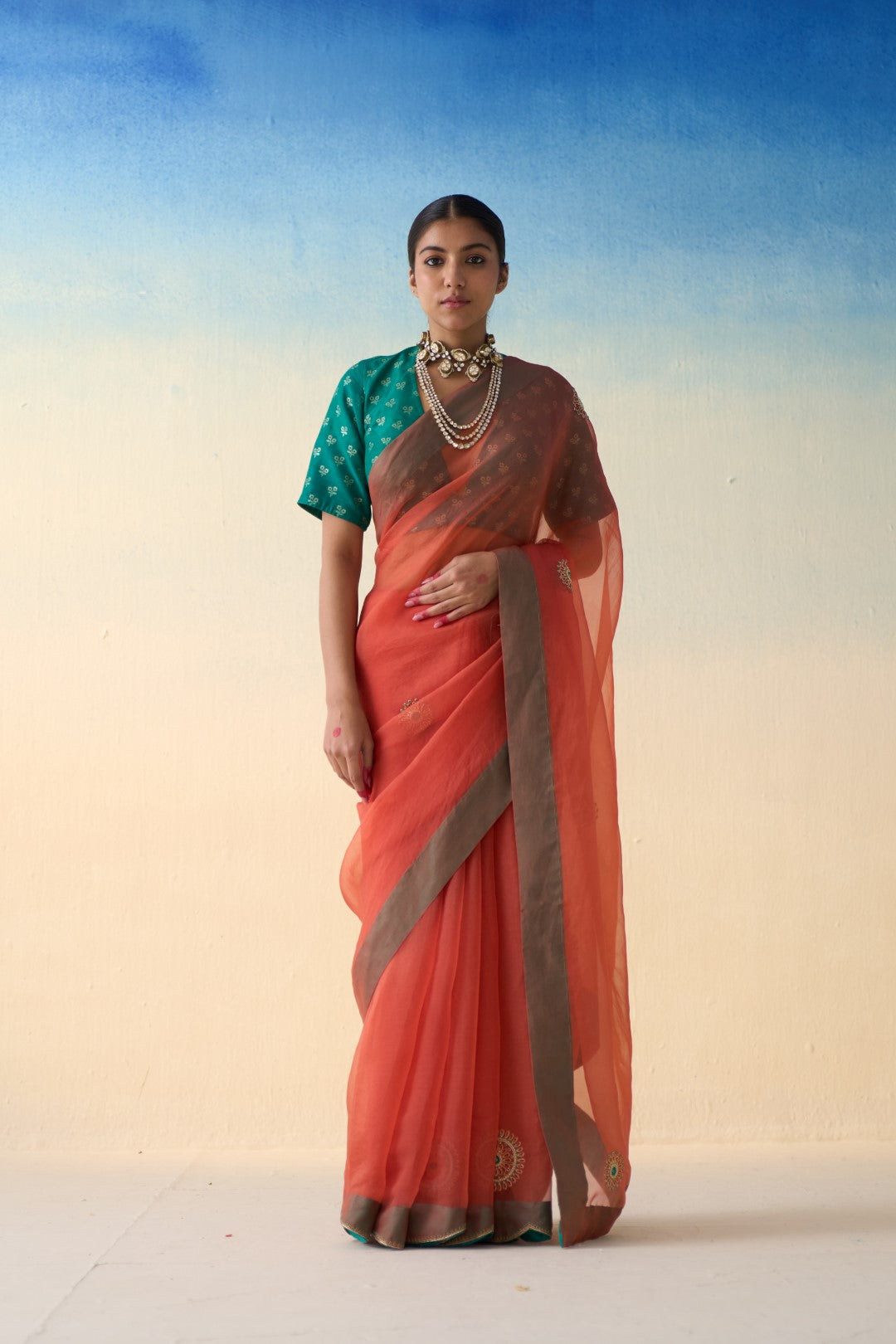 Rust organza embroidered saree comes with an organic cotton stitched petticoat (02 Pcs.)