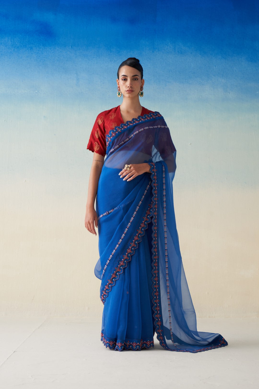 Midnight blue organza embroidered saree comes with an organic cotton stitched petticoat (02 pcs.)