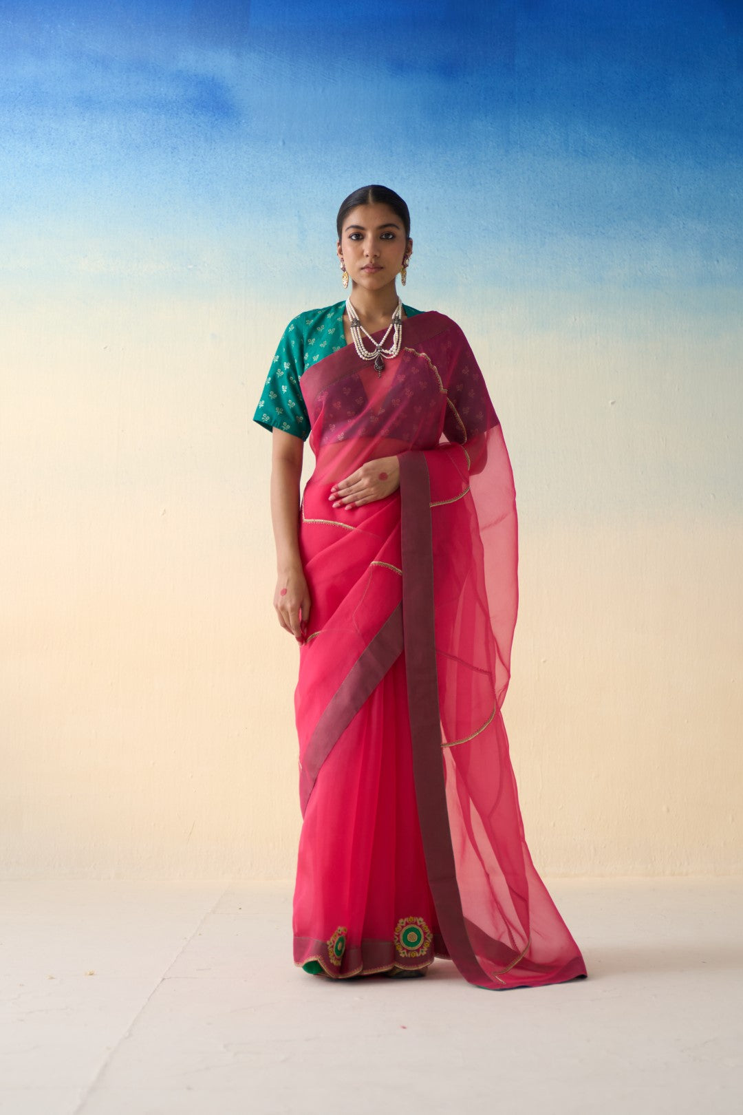 Fuchsia pink organza embroidered  saree comes with an organic cotton stitched petticoat (02 Pcs.)