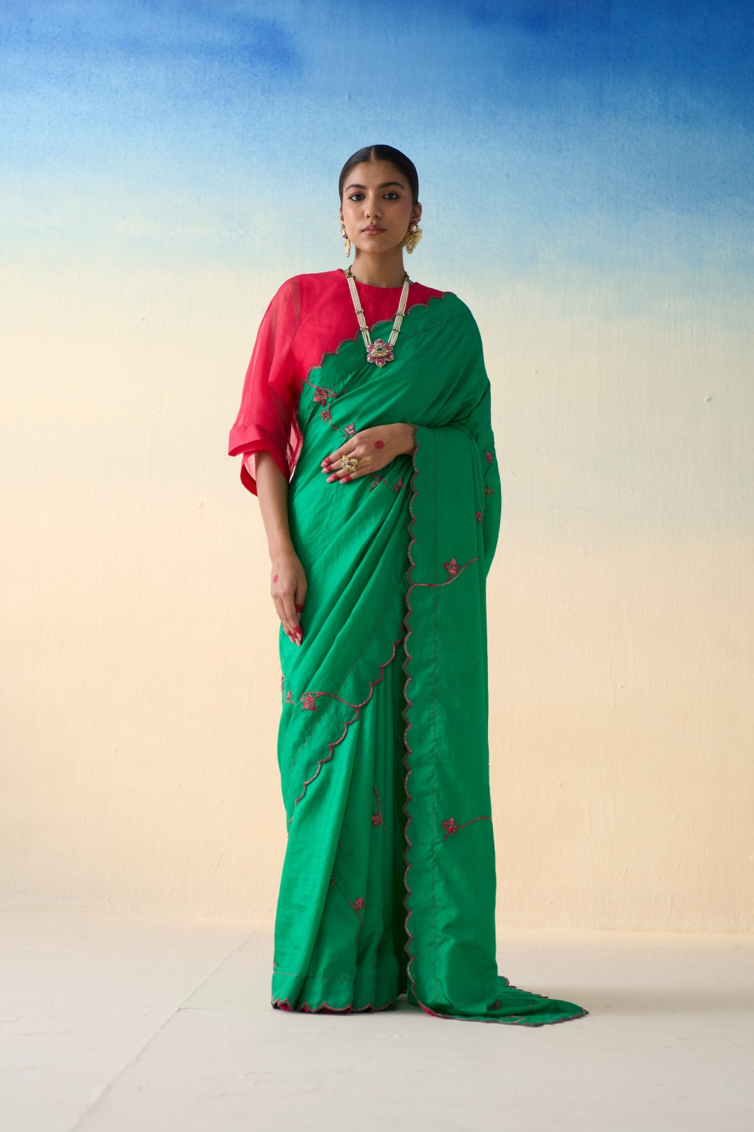 Green multicolor embroidered silk saree comes with an organic cotton stitched petticoat (02 Pcs.)