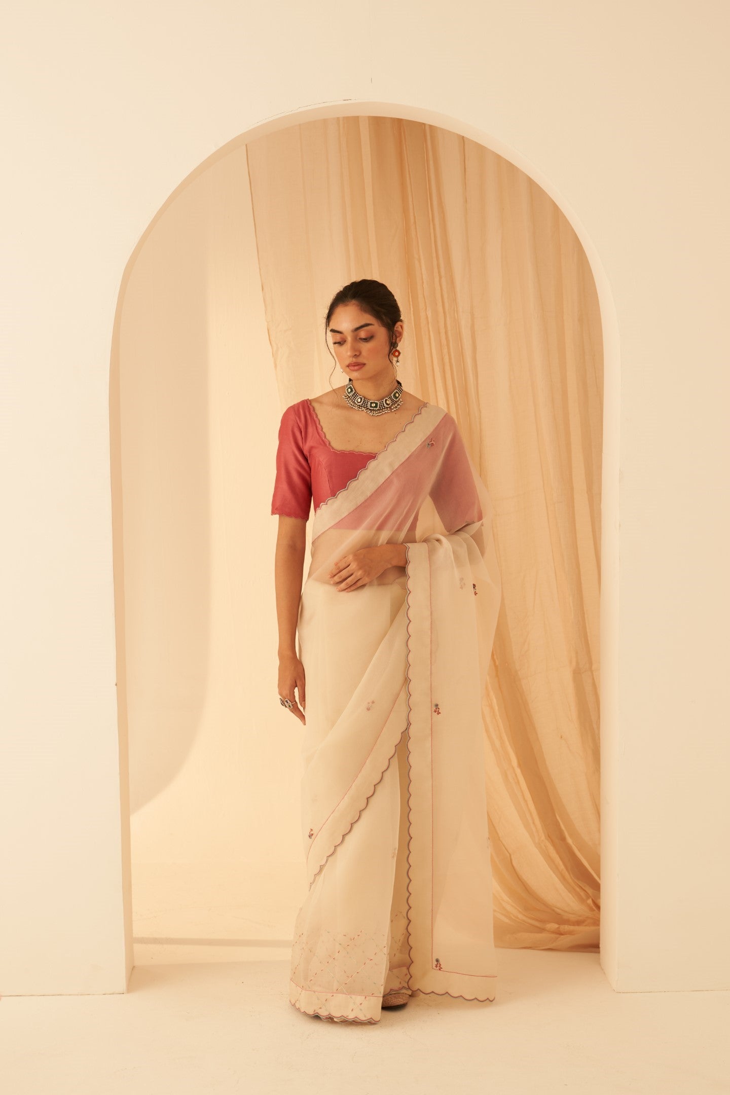 Ivory organza bullion & elegant resham jaal work saree paired with an organic & cotton stitched petticoat