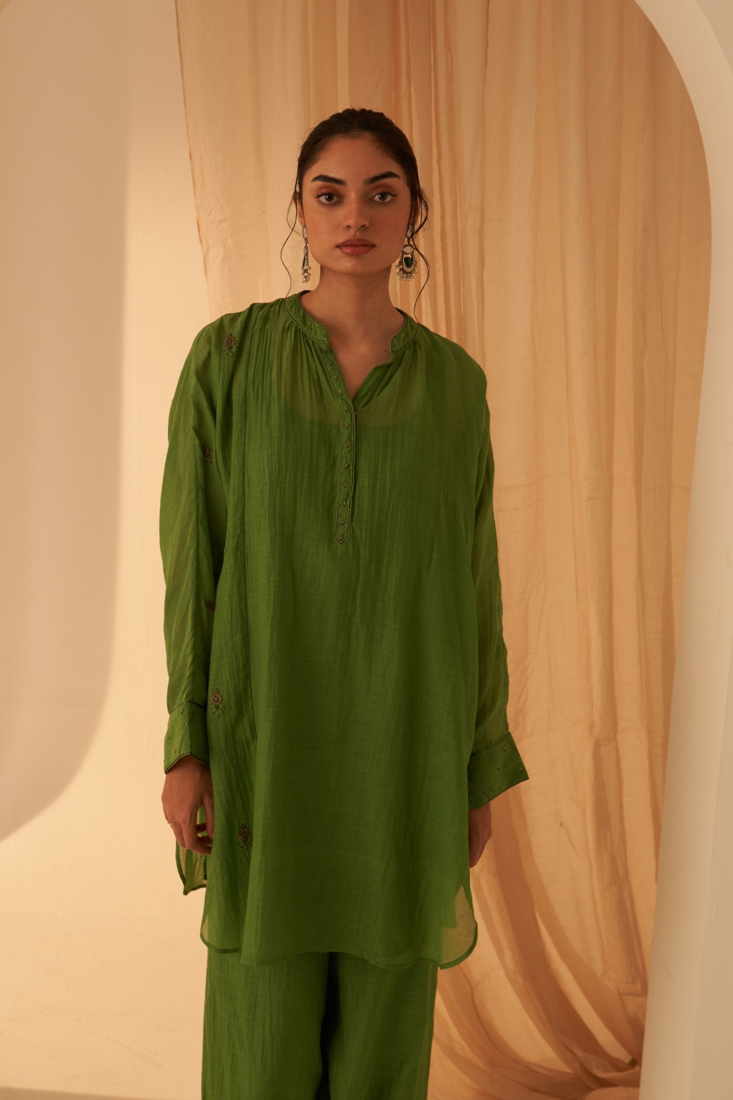 Green chanderi resham buti  embroidered tunic paired with cotton slip & salwar