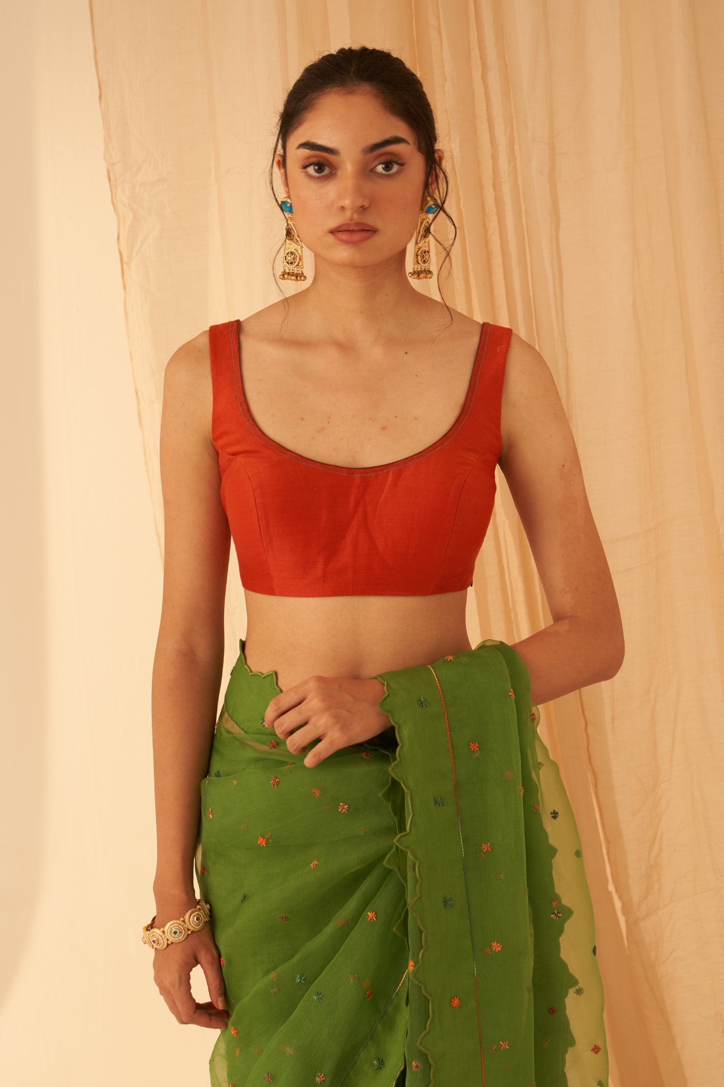 Rust chanderi sleeveless stitched blouse