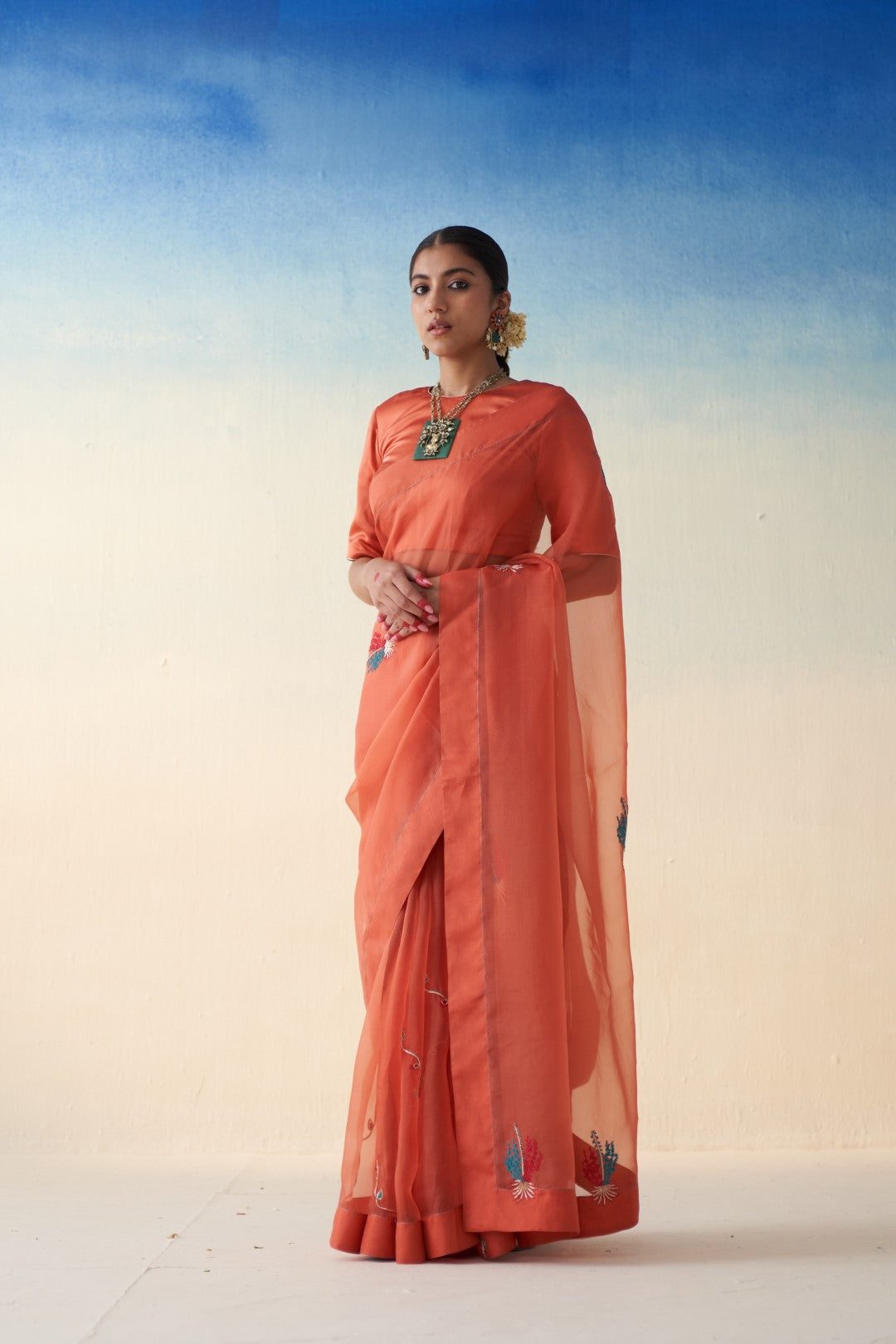 Rust organza motifs embroidered saree comes with an organic cotton stitched petticoat (02 Pcs.)