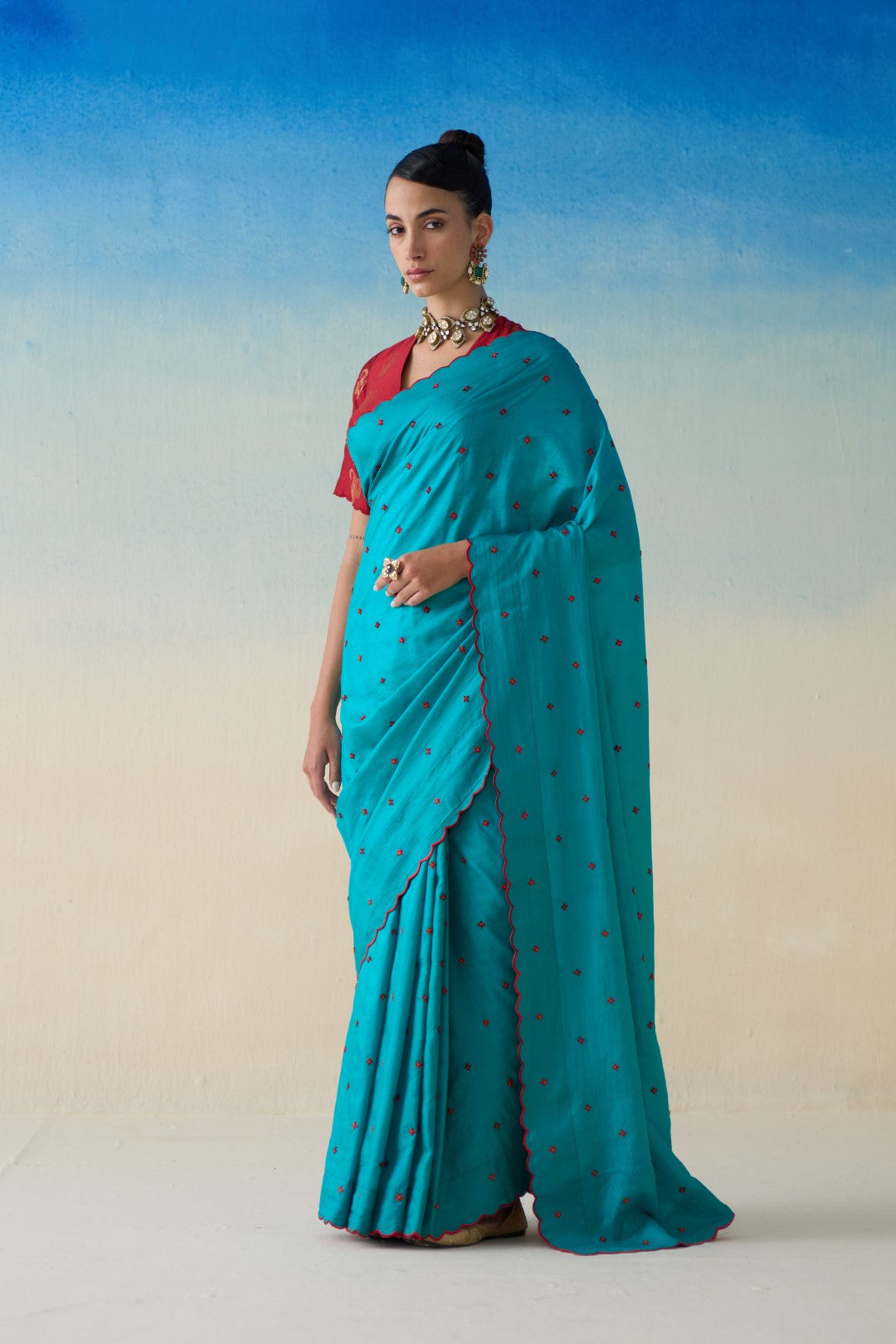 Turquoise silk embroidered saree comes with an organic cotton stitched petticoat ( 02 Pcs.)