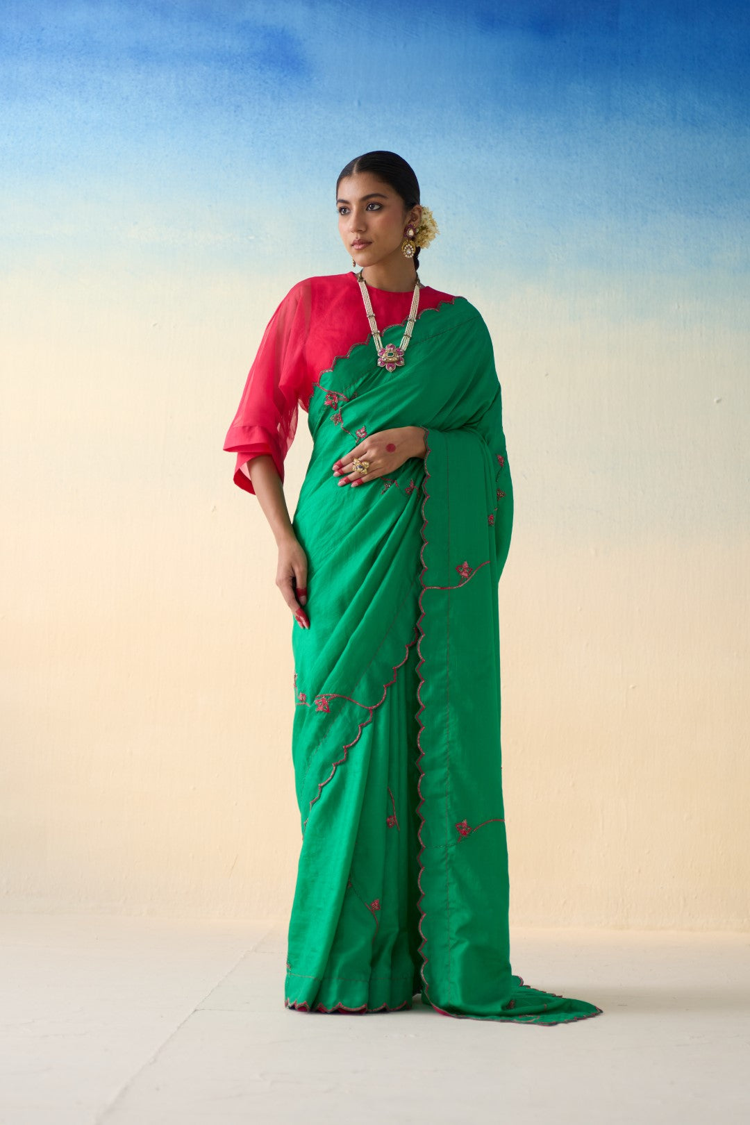 Green multicolor embroidered silk saree comes with an organic cotton stitched petticoat (02 Pcs.)