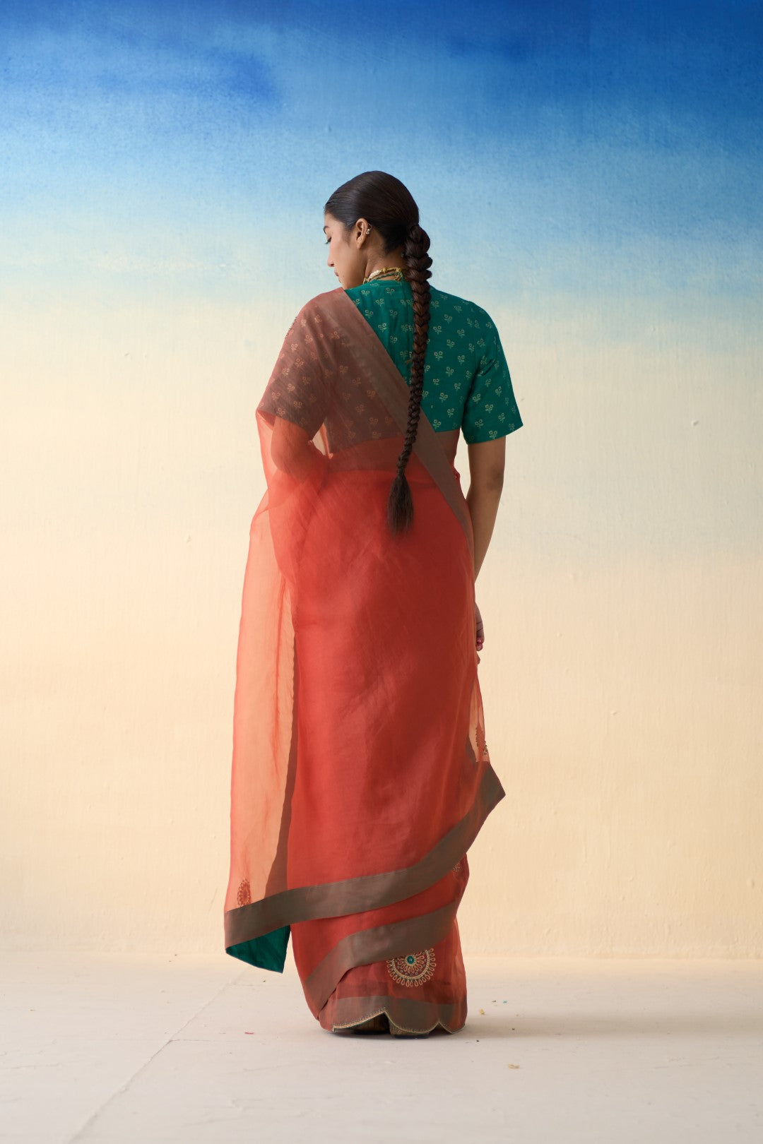 Rust organza embroidered saree comes with an organic cotton stitched petticoat (02 Pcs.)