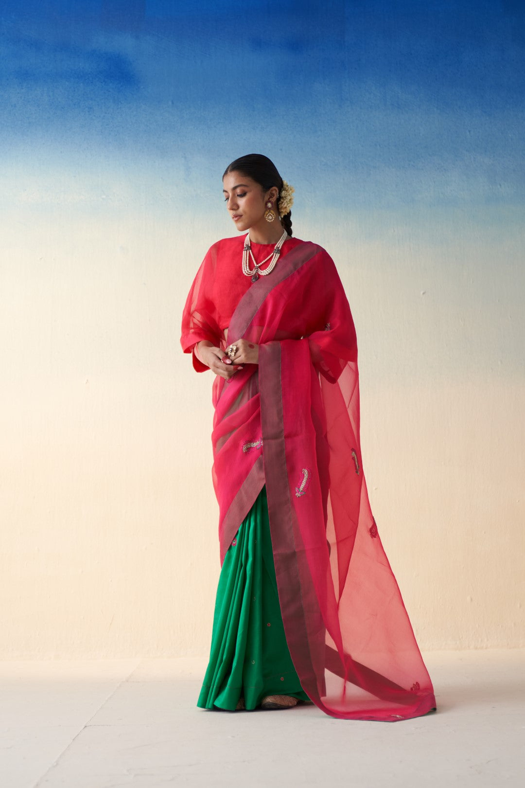 Green- Fuchsia jaal embroidered organza saree comes with an organic cotton stitched petticoat (02 Pcs.)