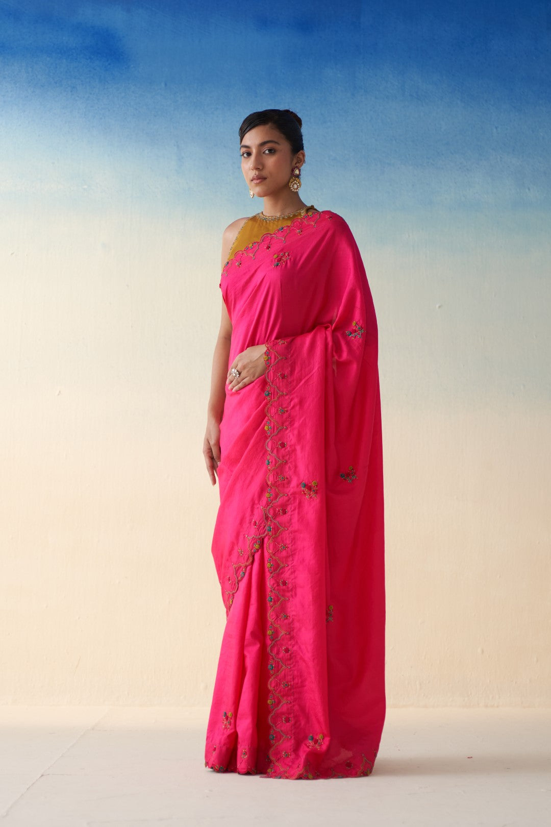 Magenta Silk multicolor embroidered saree comes with an organic cotton stitched petticoat (02 Pcs.)