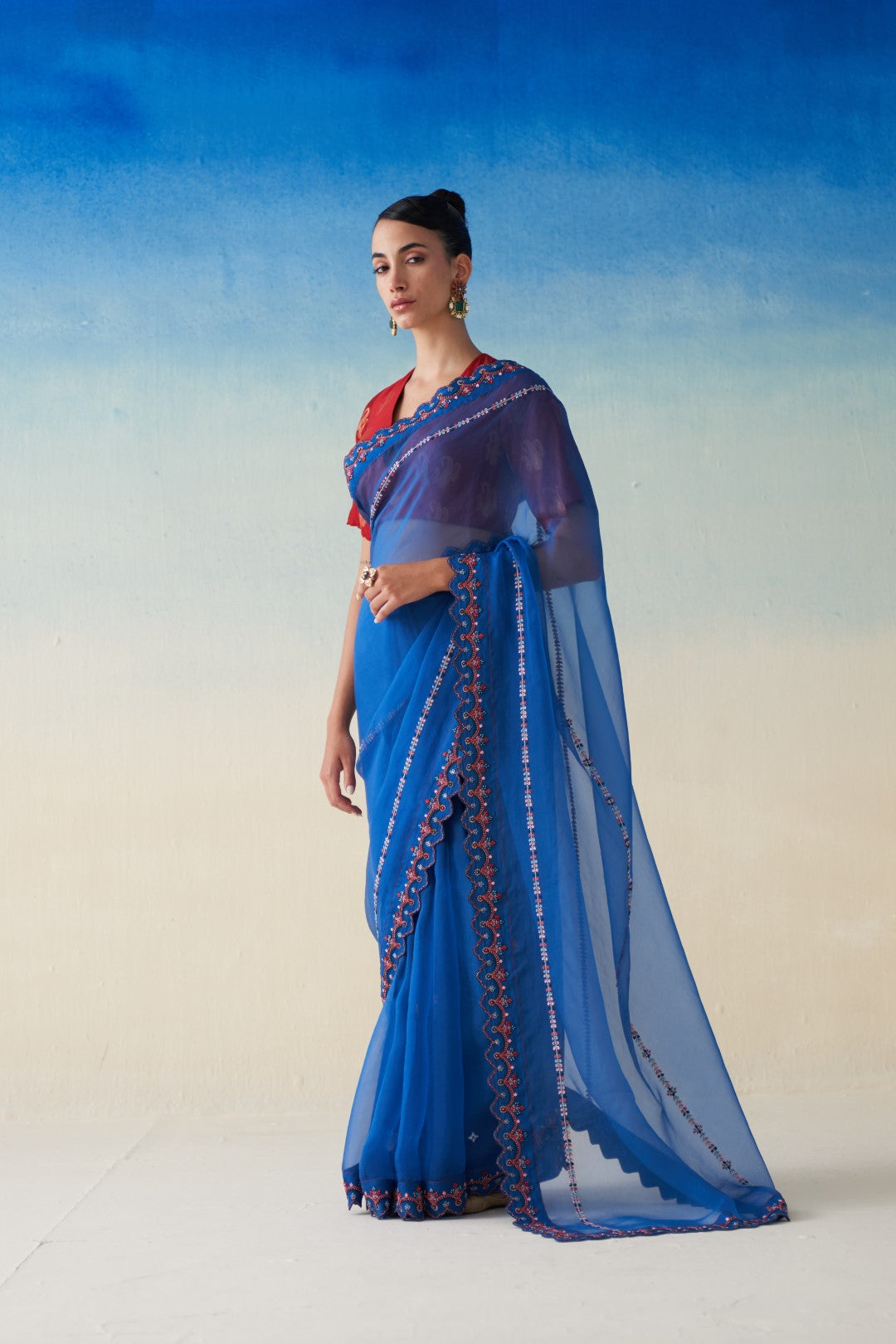 Midnight blue organza embroidered saree comes with an organic cotton stitched petticoat (02 pcs.)