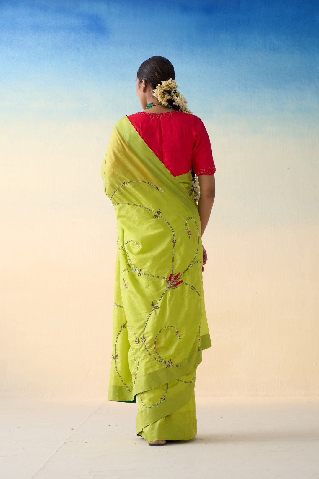 Lime green silk jaal embroidered saree comes with an organic cotton petticoat (02 Pcs.)