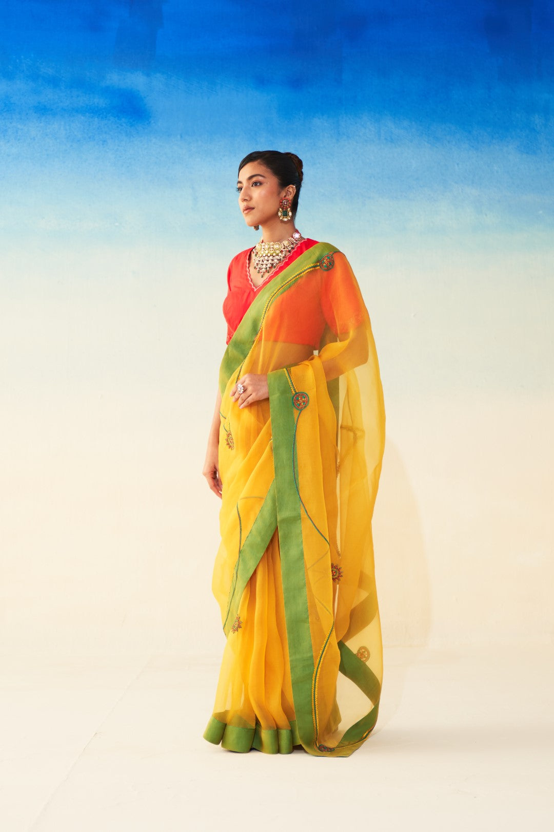 Yellow organza jaal embroidered saree comes with an organic cotton stitched petticoat (02 Pcs.)