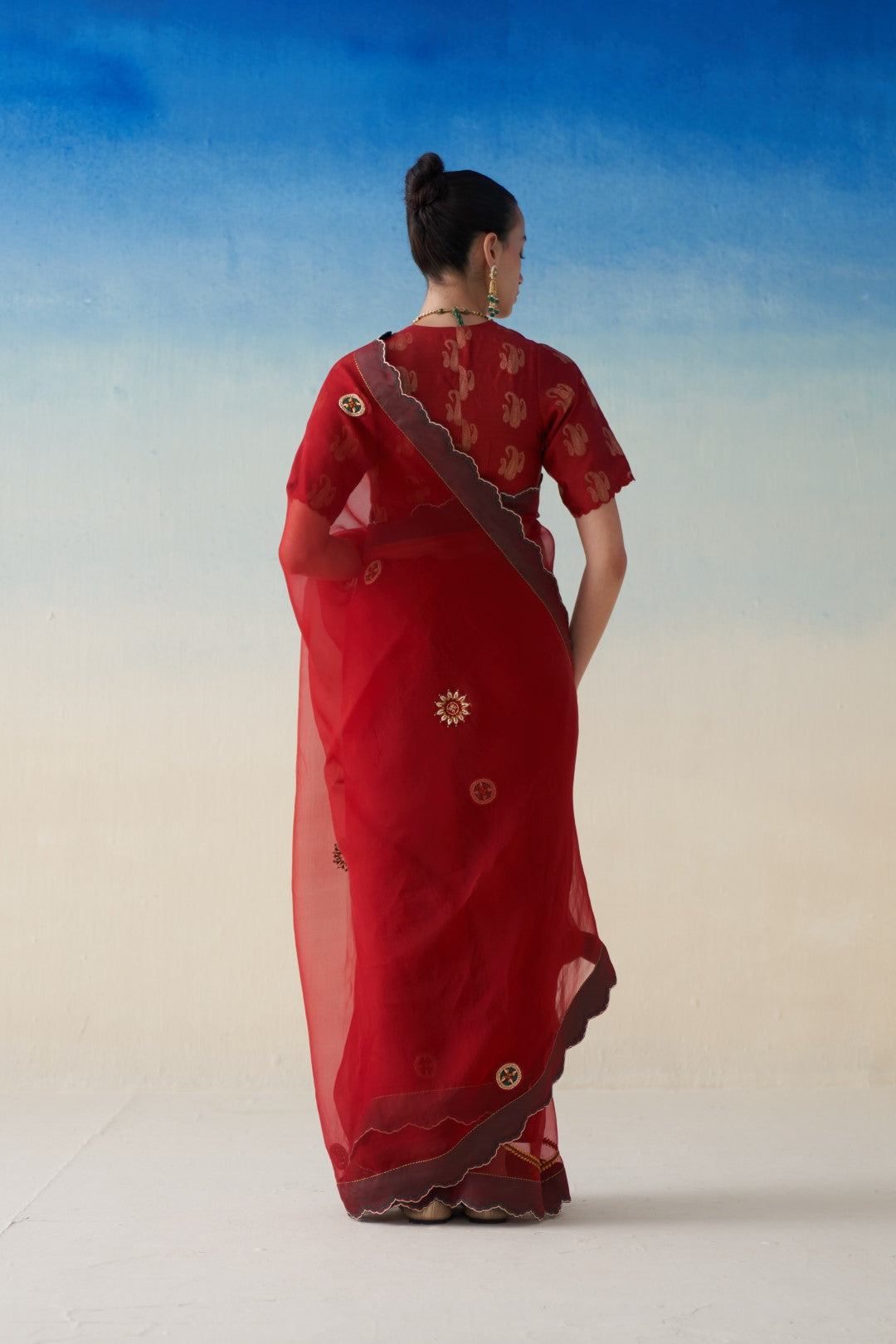 Red organza embroidered saree, comes with an organic cotton stitched petticoat (02 Pcs.)