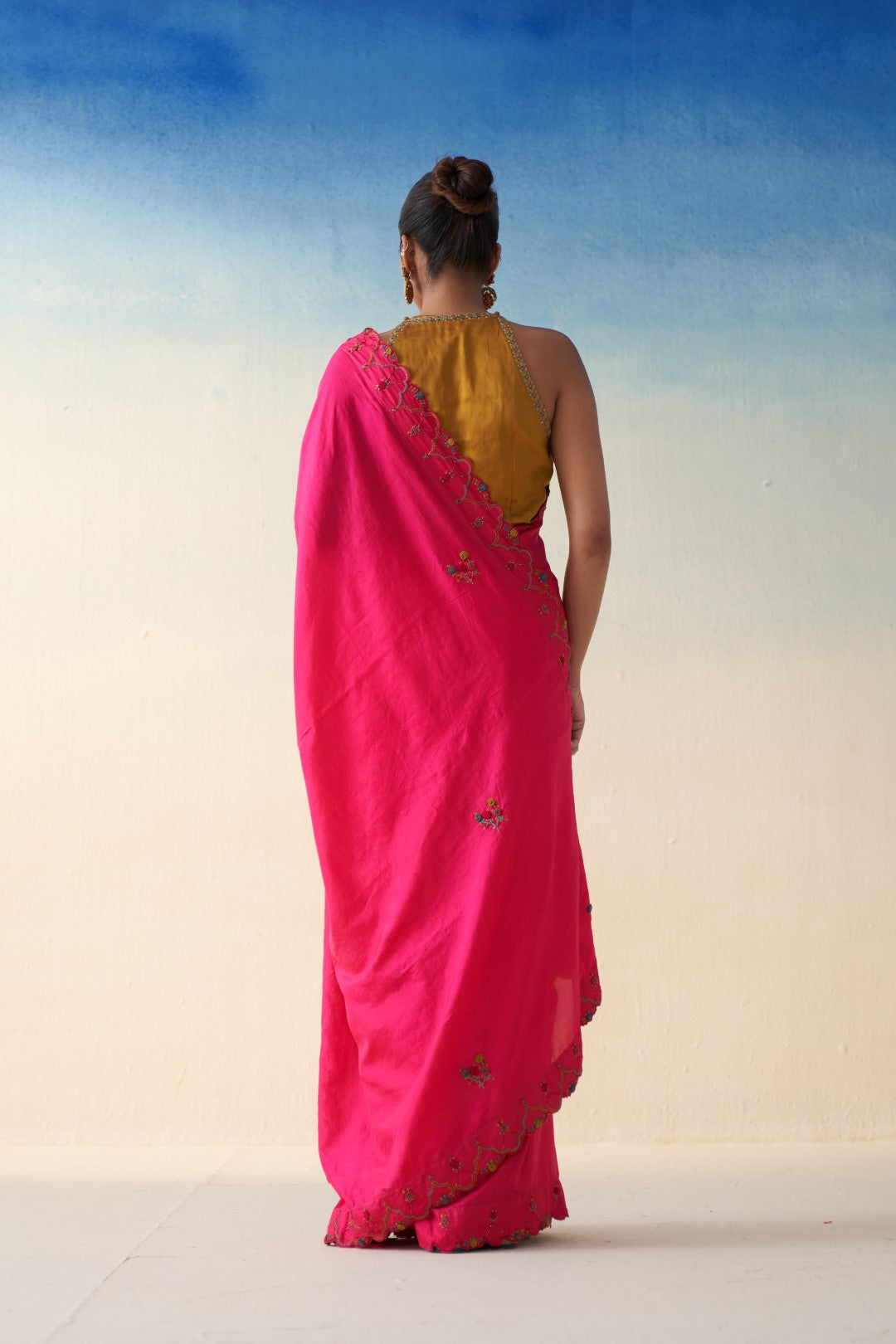 Magenta Silk multicolor embroidered saree comes with an organic cotton stitched petticoat (02 Pcs.)