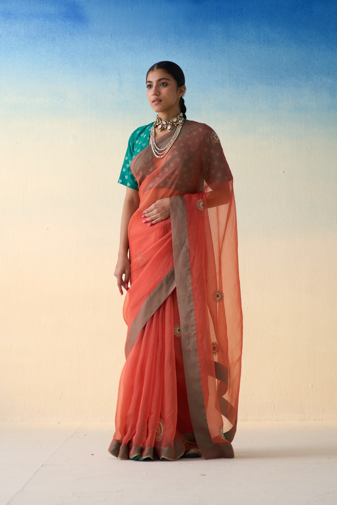 Rust organza embroidered saree comes with an organic cotton stitched petticoat (02 Pcs.)