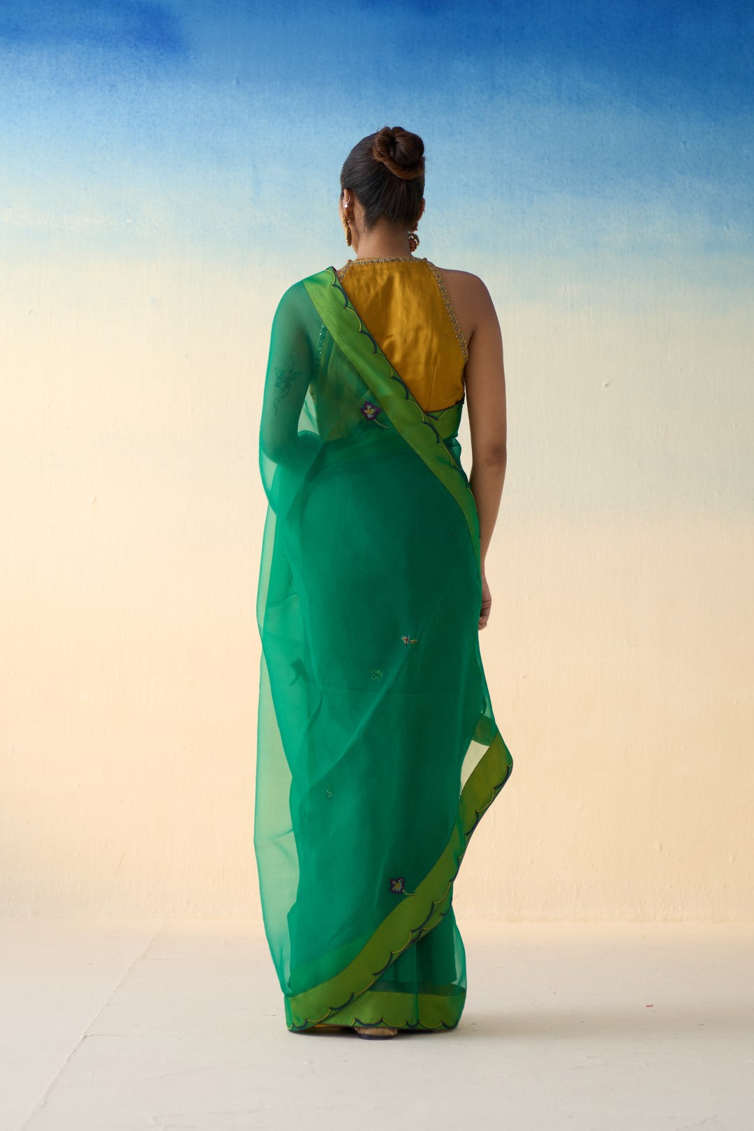 Green organza embroidered & scallop border saree comes with an organic cotton  petticoat. (02 Pcs.)