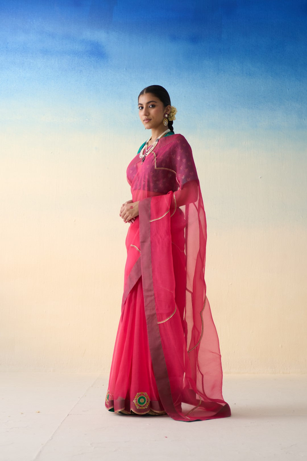 Fuchsia pink organza embroidered  saree comes with an organic cotton stitched petticoat (02 Pcs.)