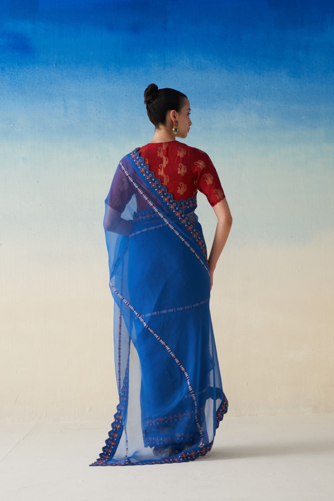 Midnight blue organza embroidered saree comes with an organic cotton stitched petticoat (02 pcs.)