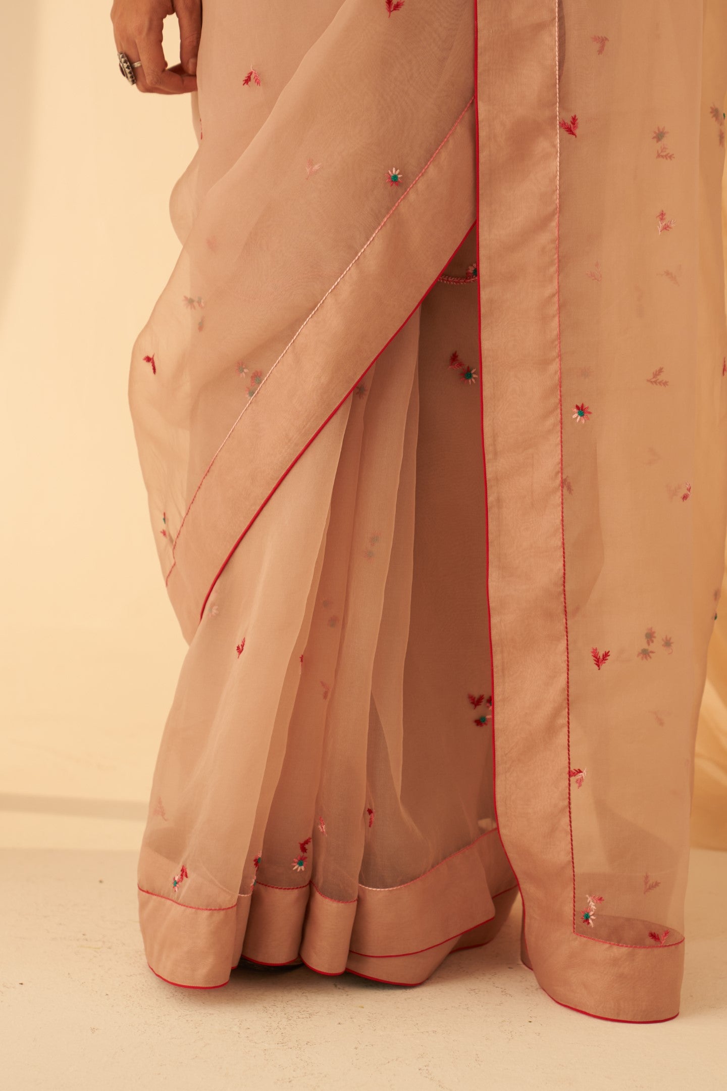 Light rose gold organza aari handwork embroidered saree paired with & organic cotton stitched petticoat