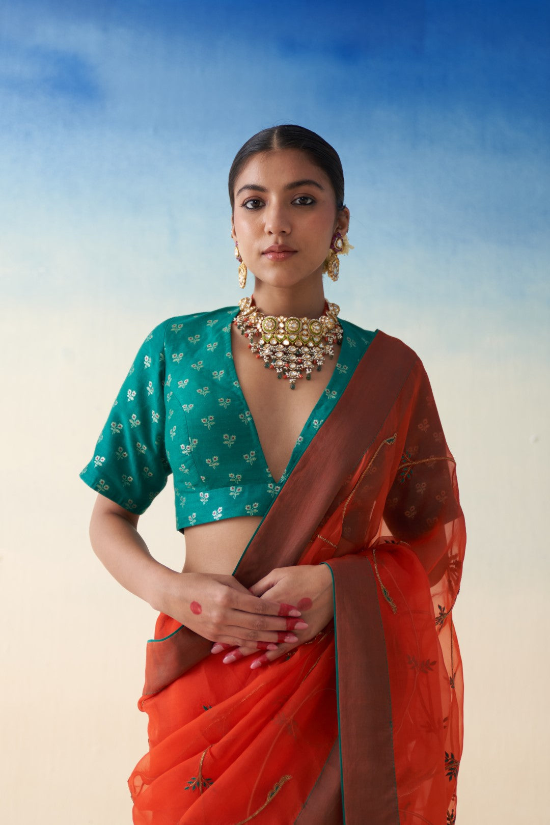 Rust jaal embroidered saree in organza comes with an organic cotton stitched petticoat (02 Pcs.)