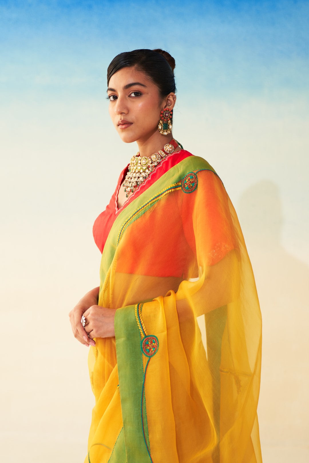 Yellow organza jaal embroidered saree comes with an organic cotton stitched petticoat (02 Pcs.)