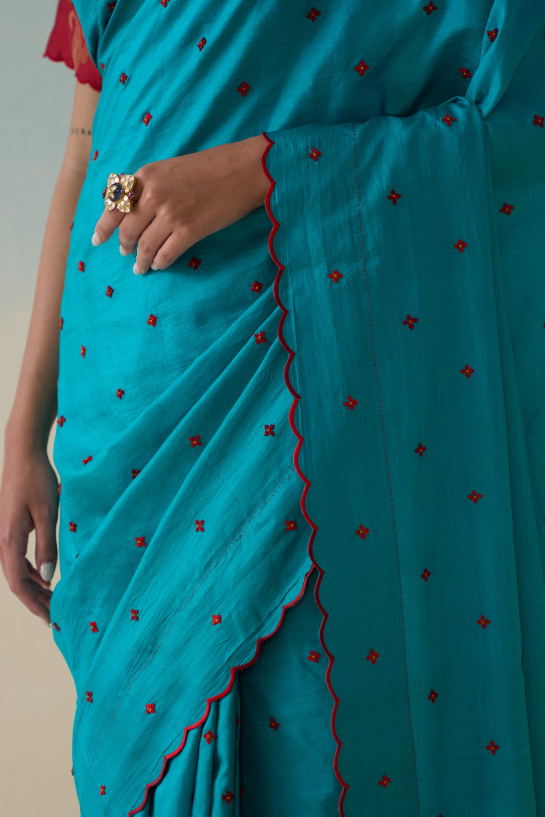 Turquoise silk embroidered saree comes with an organic cotton stitched petticoat ( 02 Pcs.)