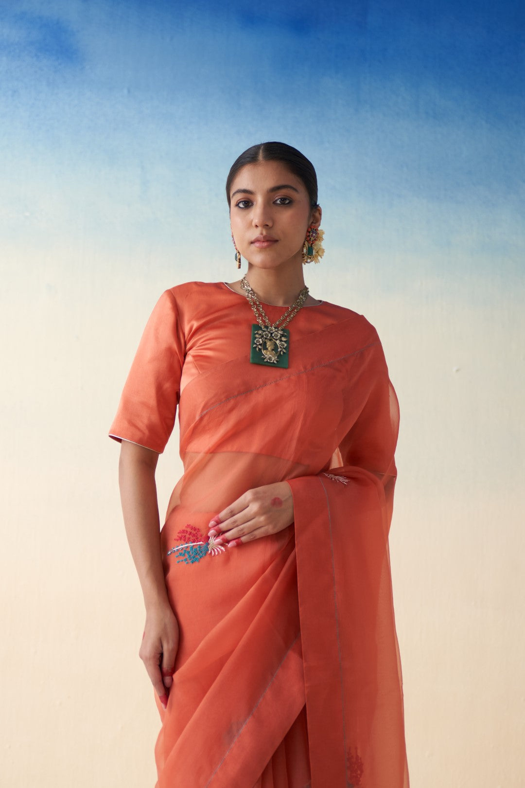 Rust organza motifs embroidered saree comes with an organic cotton stitched petticoat (02 Pcs.)