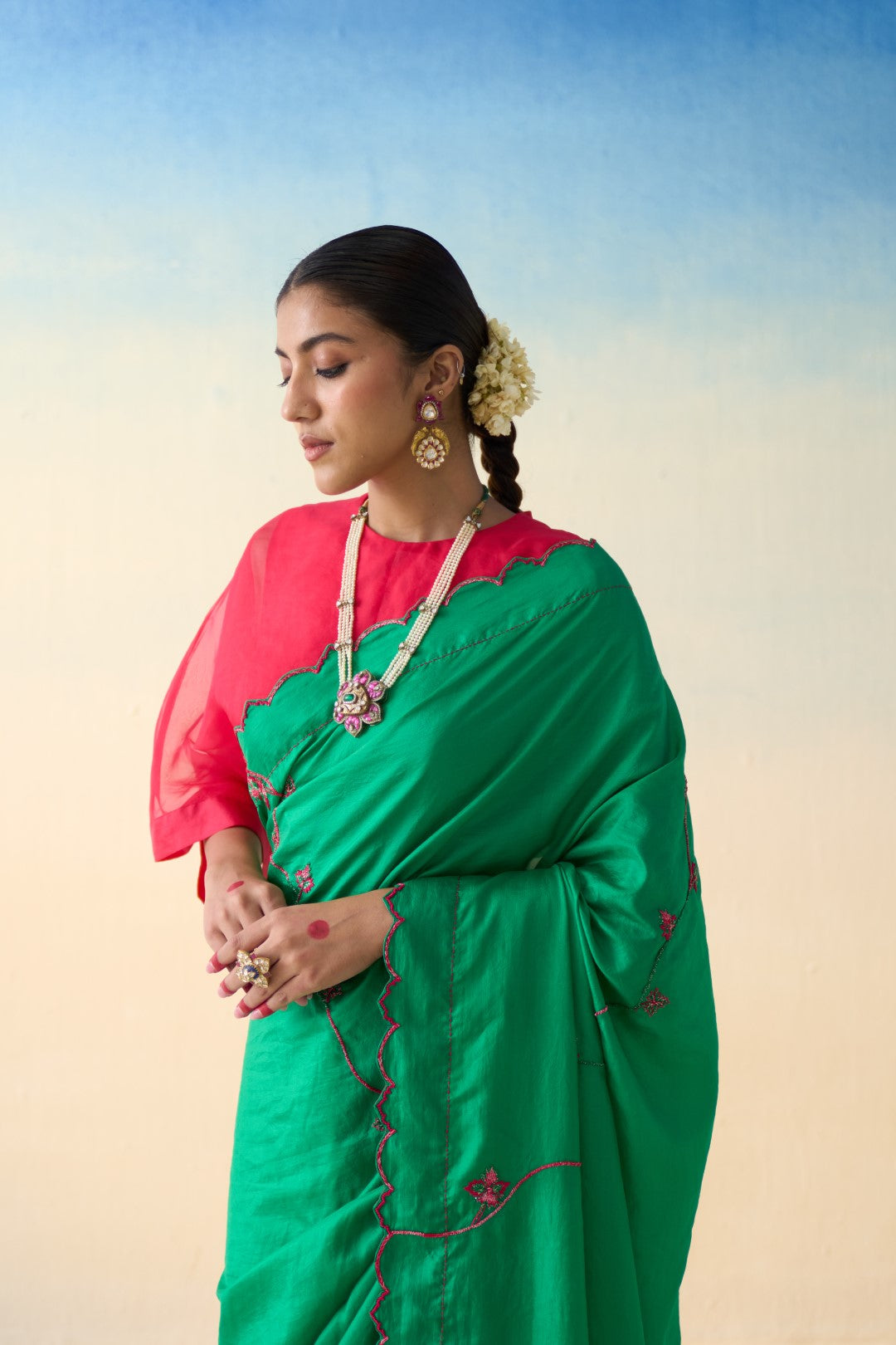 Green multicolor embroidered silk saree comes with an organic cotton stitched petticoat (02 Pcs.)