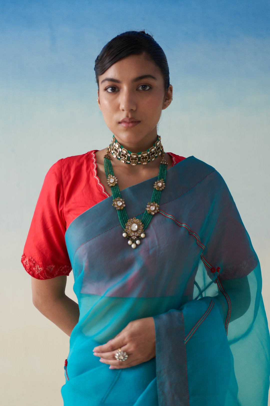 Turquoise  organza  embroidered saree comes with an organic cotton stitched petticoat (02 Pcs.)