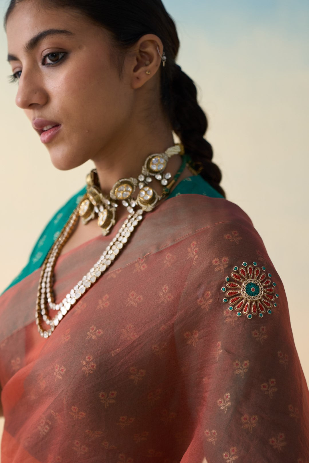 Rust organza embroidered saree comes with an organic cotton stitched petticoat (02 Pcs.)