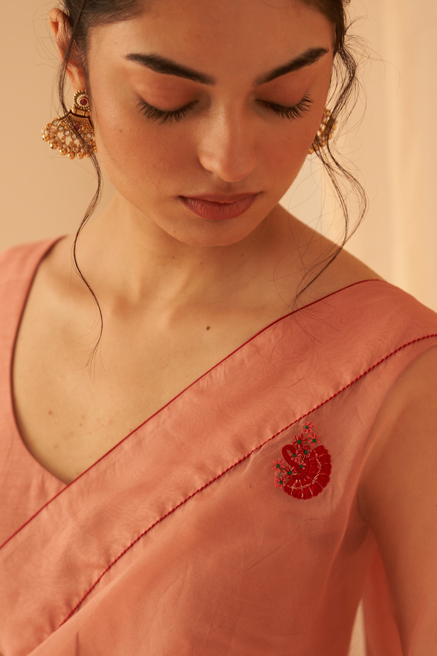 Peach organza thread zardozi hand embroidered saree paired with an organic cotton stitched petticoat