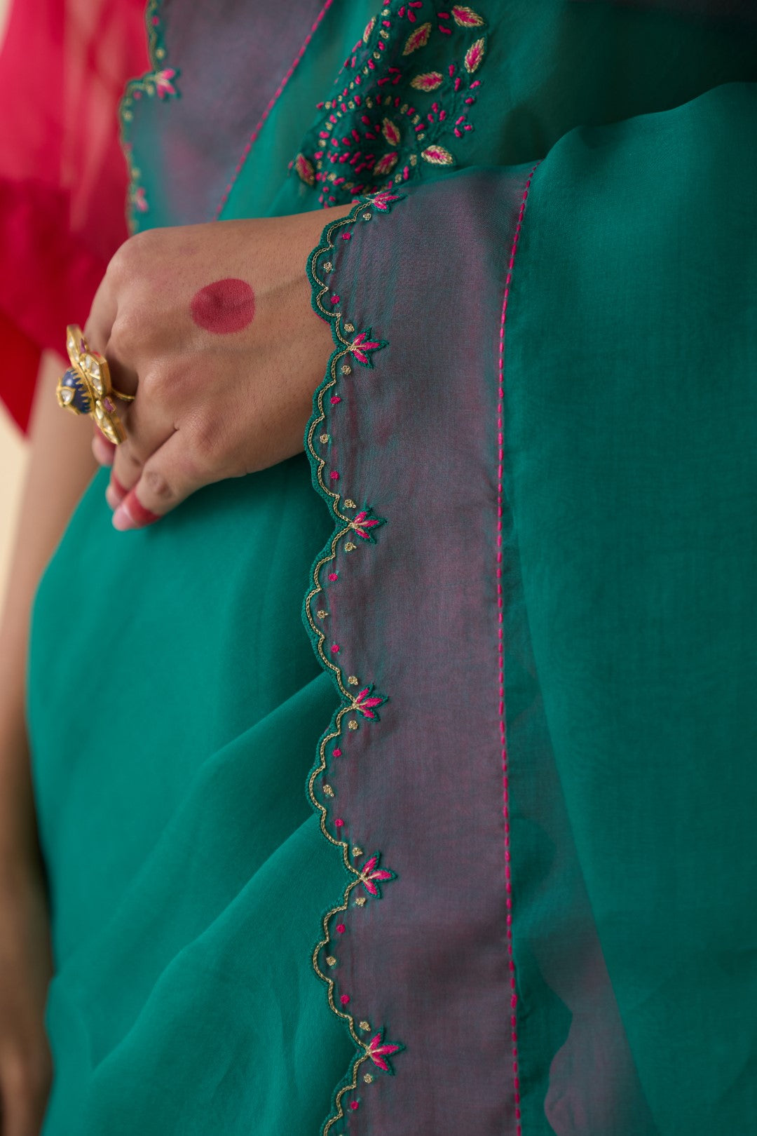 Green organza motifs embroidered saree complemented with an organic cotton stitched petticoat (02 Pcs.)