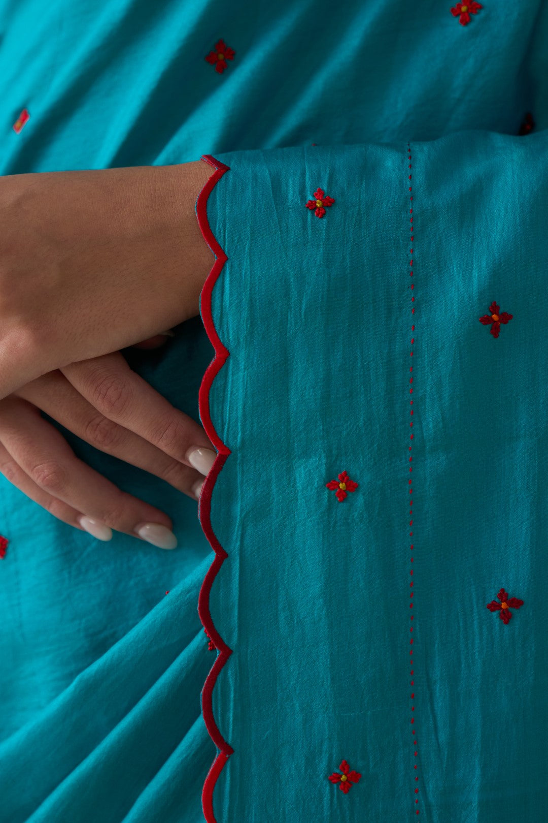 Turquoise silk embroidered saree comes with an organic cotton stitched petticoat ( 02 Pcs.)