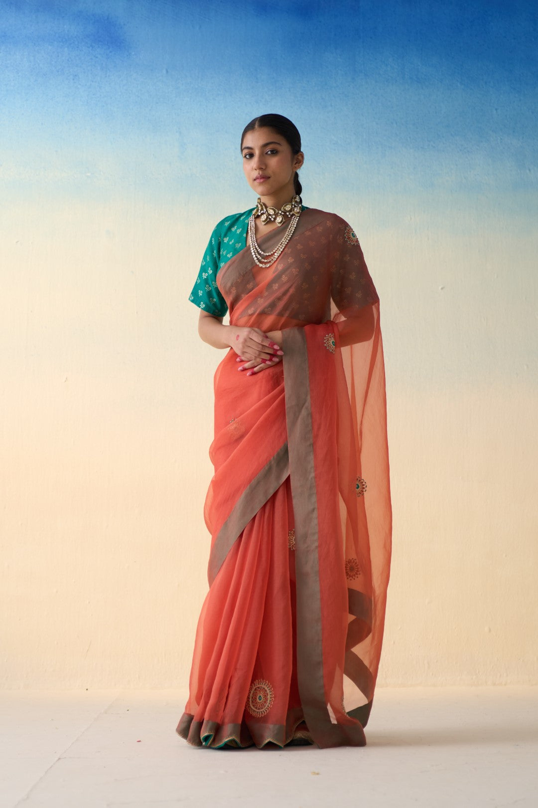 Rust organza embroidered saree comes with an organic cotton stitched petticoat (02 Pcs.)