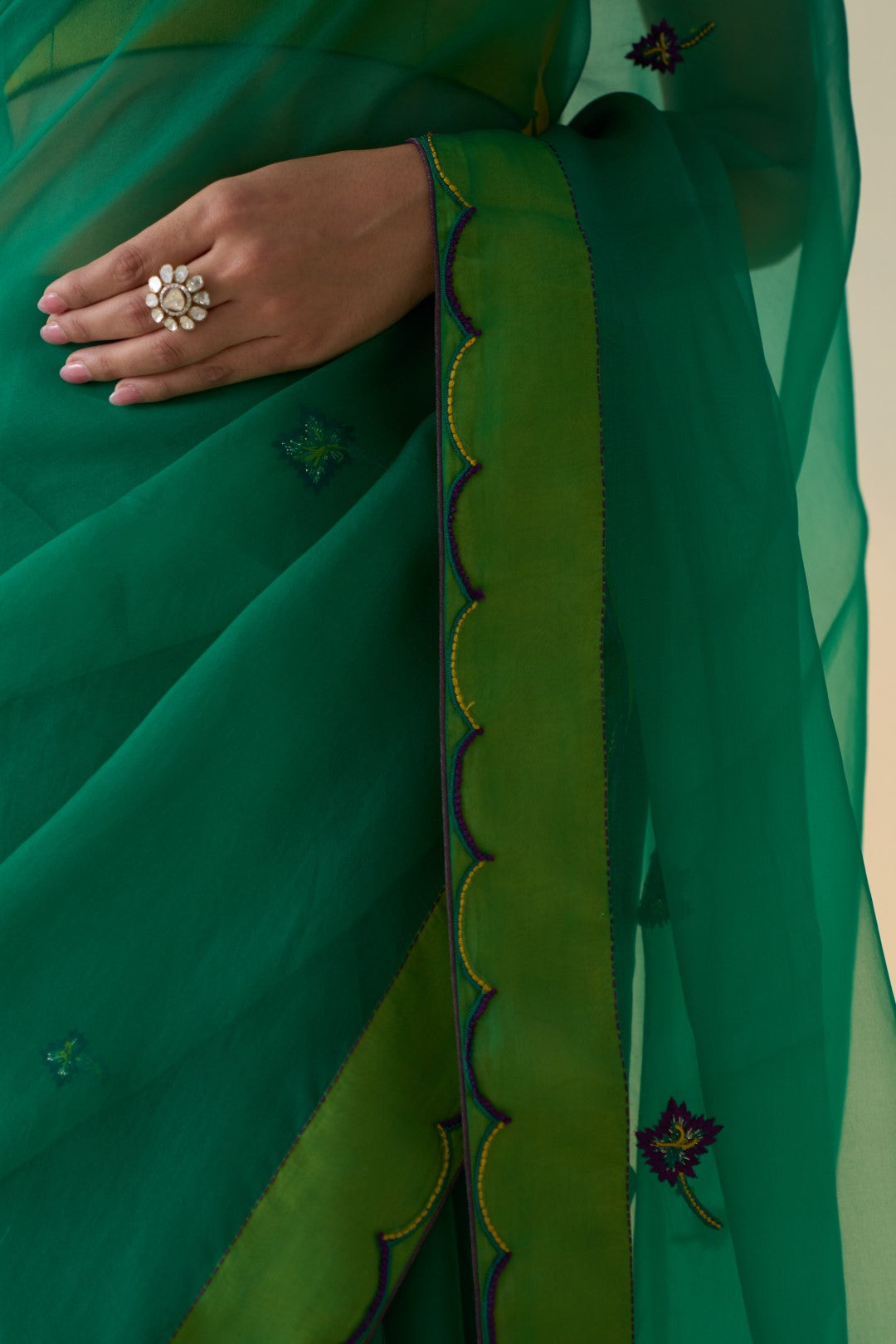 Green organza embroidered & scallop border saree comes with an organic cotton  petticoat. (02 Pcs.)