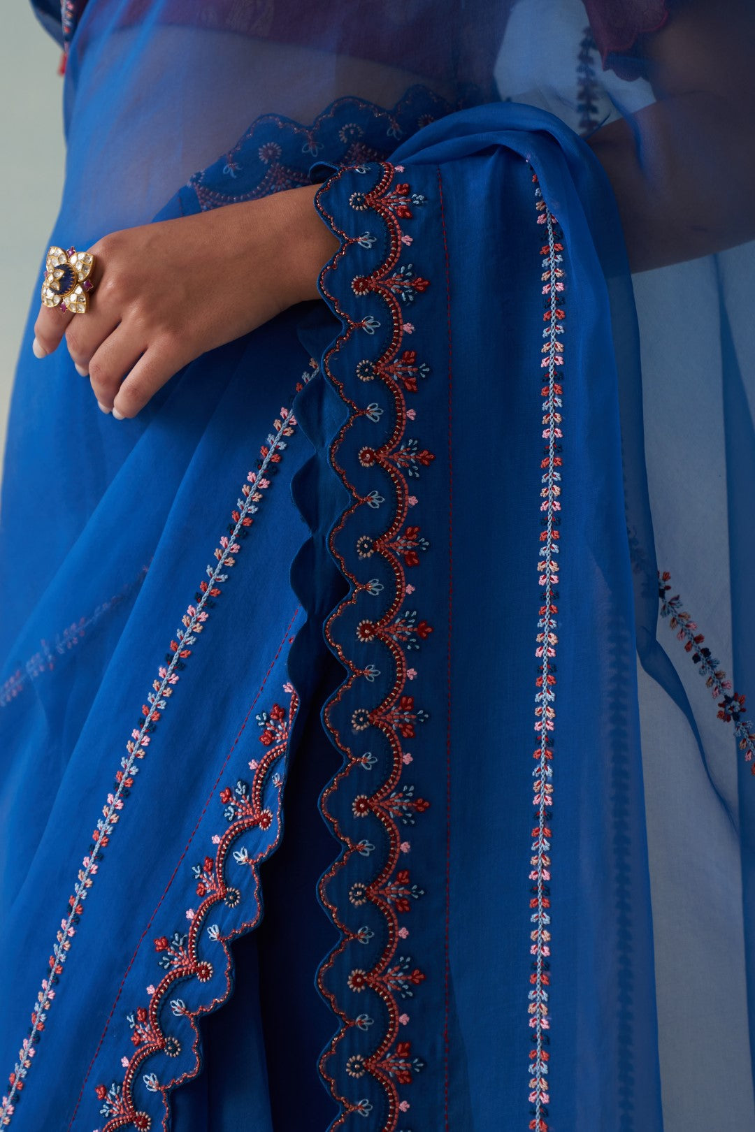 Midnight blue organza embroidered saree comes with an organic cotton stitched petticoat (02 pcs.)