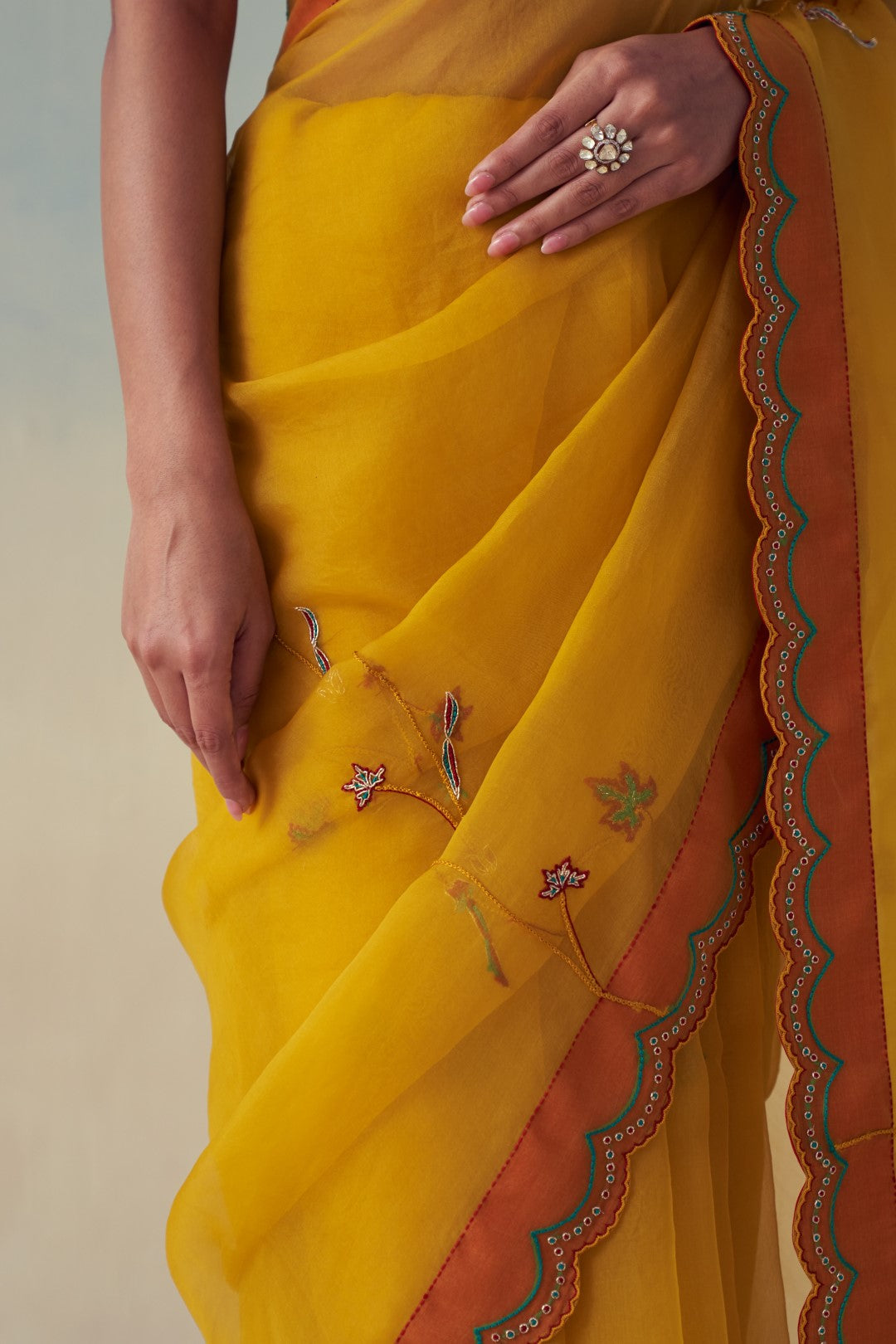 Yellow organza multicolor floral jaal embroidered saree comes with an organic cotton stitched petticoat (02 Pcs.)