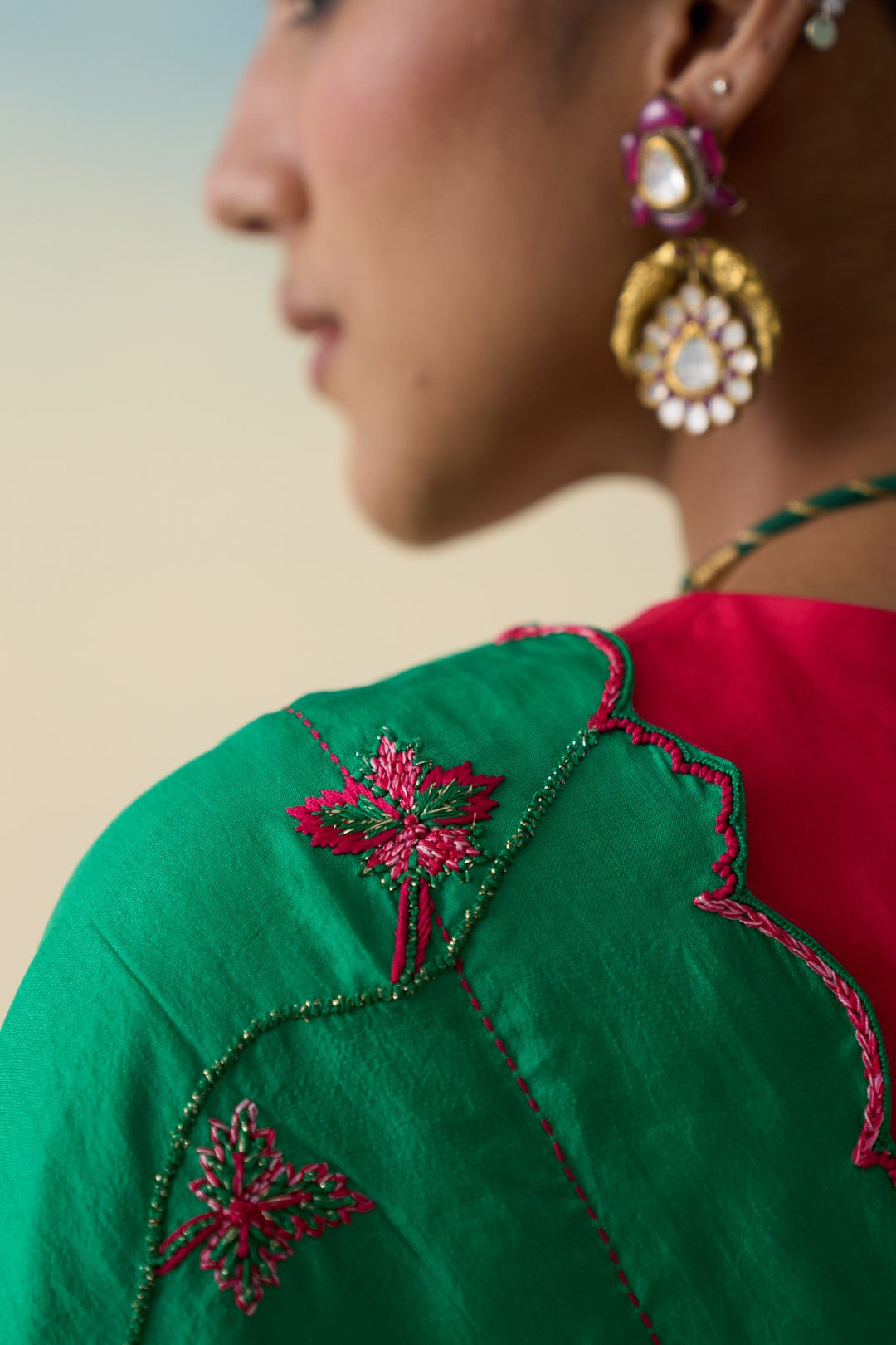 Green multicolor embroidered silk saree comes with an organic cotton stitched petticoat (02 Pcs.)