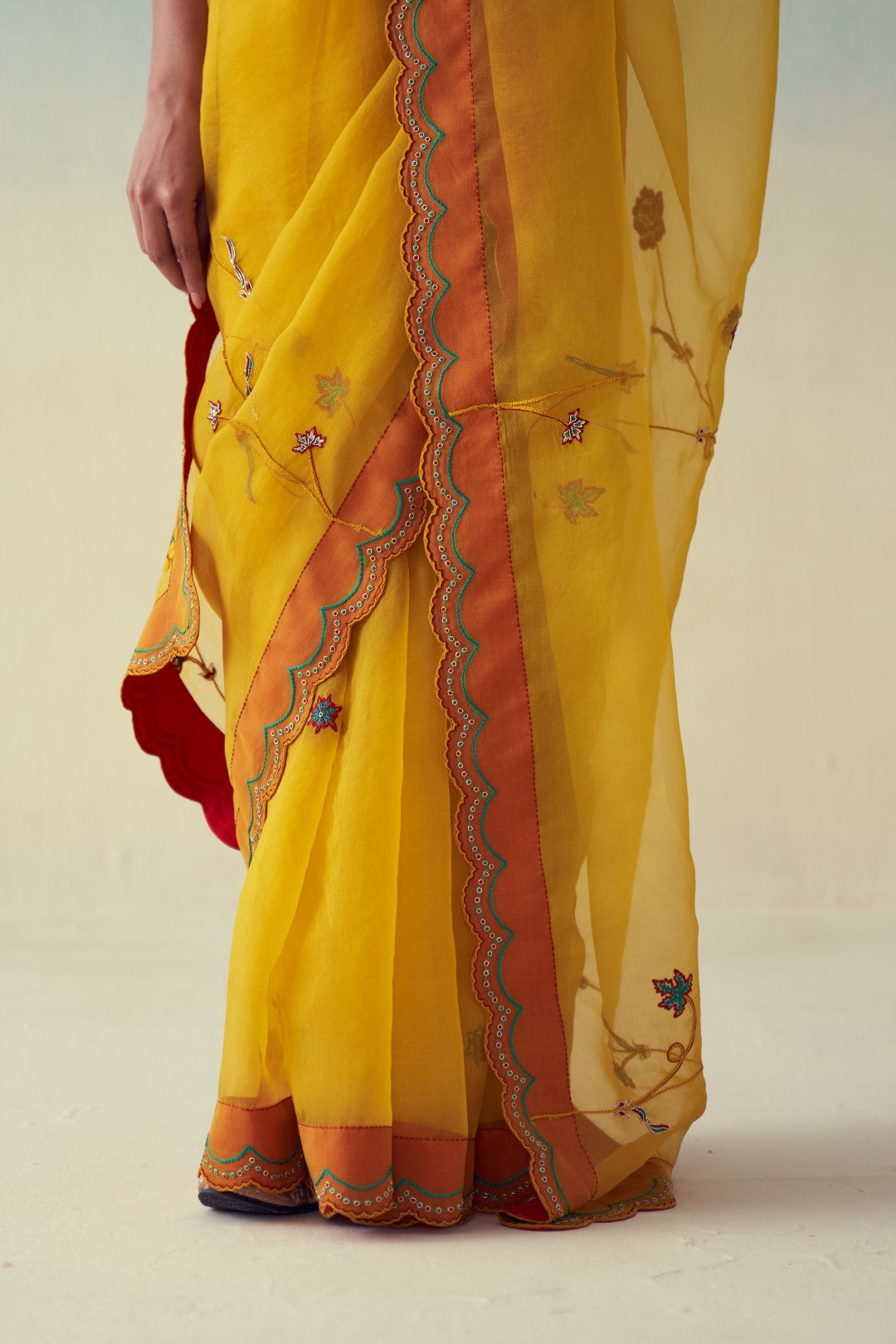 Yellow organza multicolor floral jaal embroidered saree comes with an organic cotton stitched petticoat (02 Pcs.)