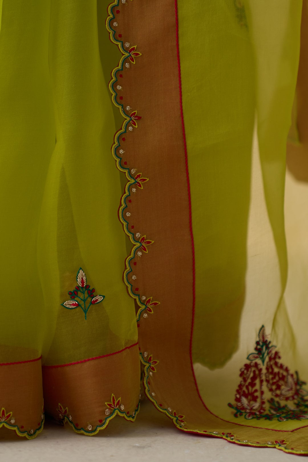 Lime yellow organza floral motifs saree comes with an organic cotton stitched petticoat (02 Pcs.)