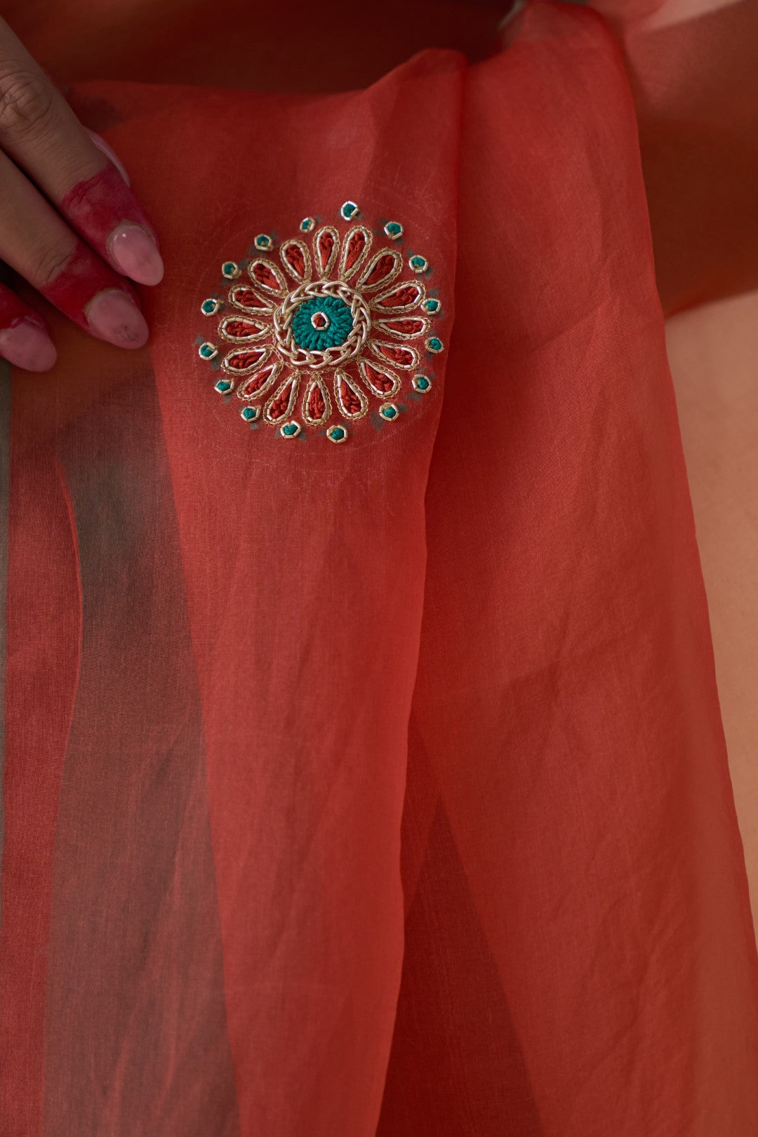 Rust organza embroidered saree comes with an organic cotton stitched petticoat (02 Pcs.)